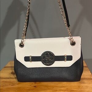 Guess Katlin convertible crossbody handbag in a white and dark blue